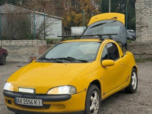 Желтый Опель Тигра, объемом двигателя 1.4 л и пробегом 180 тыс. км за 1350 $, фото 12 на Automoto.ua