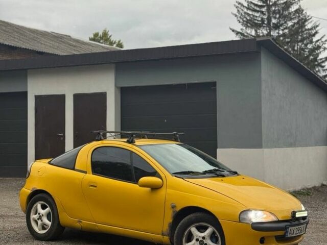 Желтый Опель Тигра, объемом двигателя 1.4 л и пробегом 180 тыс. км за 1350 $, фото 1 на Automoto.ua