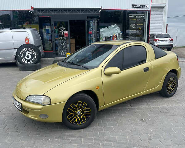 Желтый Опель Тигра, объемом двигателя 1.6 л и пробегом 124 тыс. км за 3500 $, фото 1 на Automoto.ua