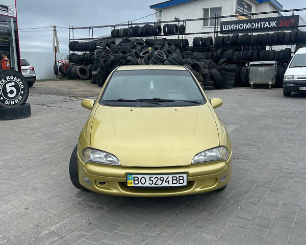 Желтый Опель Тигра, объемом двигателя 1.6 л и пробегом 124 тыс. км за 3500 $, фото 8 на Automoto.ua