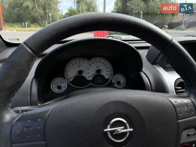 Сірий Опель Тігра, об'ємом двигуна 1.4 л та пробігом 143 тис. км за 4500 $, фото 7 на Automoto.ua