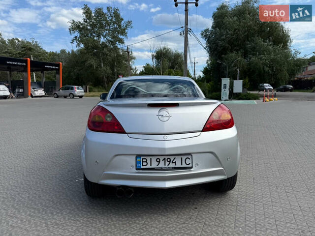 Сірий Опель Тігра, об'ємом двигуна 1.4 л та пробігом 143 тис. км за 4500 $, фото 2 на Automoto.ua