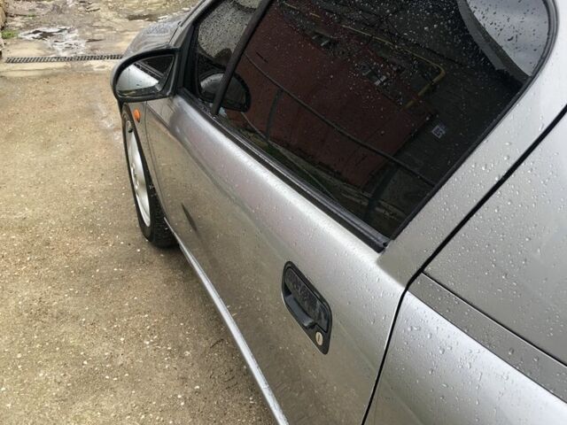 Серый Опель Тигра, объемом двигателя 1.4 л и пробегом 2 тыс. км за 2100 $, фото 7 на Automoto.ua