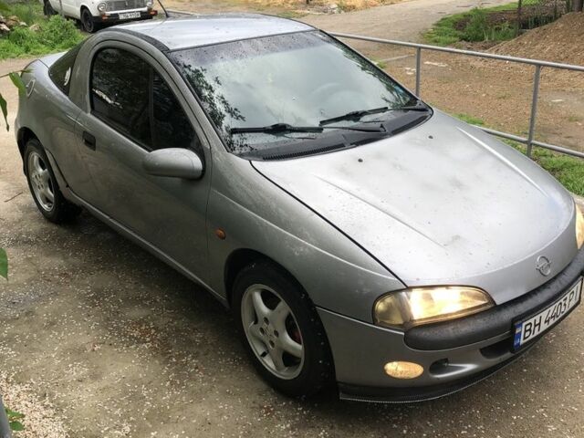 Серый Опель Тигра, объемом двигателя 1.4 л и пробегом 2 тыс. км за 2100 $, фото 1 на Automoto.ua