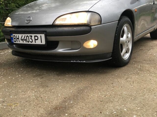 Серый Опель Тигра, объемом двигателя 1.4 л и пробегом 2 тыс. км за 2100 $, фото 2 на Automoto.ua