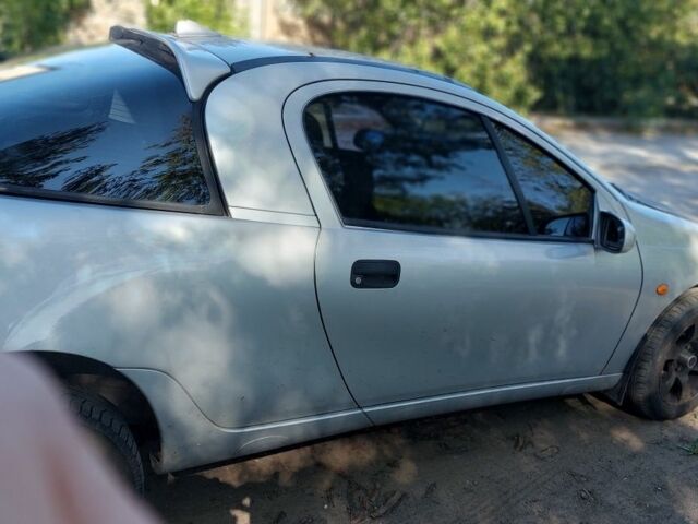 Серый Опель Тигра, объемом двигателя 1.6 л и пробегом 158 тыс. км за 2600 $, фото 3 на Automoto.ua