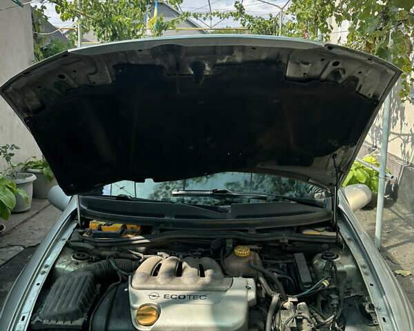 Серый Опель Тигра, объемом двигателя 1.4 л и пробегом 188 тыс. км за 2800 $, фото 10 на Automoto.ua