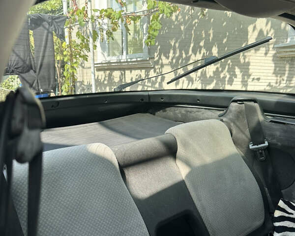 Серый Опель Тигра, объемом двигателя 1.4 л и пробегом 188 тыс. км за 2800 $, фото 6 на Automoto.ua