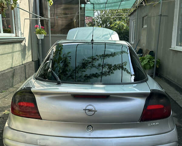 Серый Опель Тигра, объемом двигателя 1.4 л и пробегом 188 тыс. км за 2800 $, фото 8 на Automoto.ua