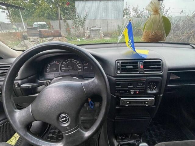 Сірий Опель Тігра, об'ємом двигуна 1.6 л та пробігом 326 тис. км за 1500 $, фото 8 на Automoto.ua