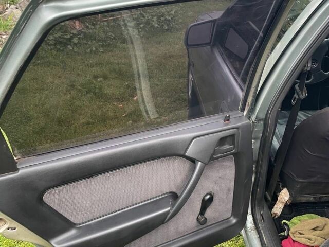 Сірий Опель Тігра, об'ємом двигуна 1.6 л та пробігом 326 тис. км за 1500 $, фото 7 на Automoto.ua