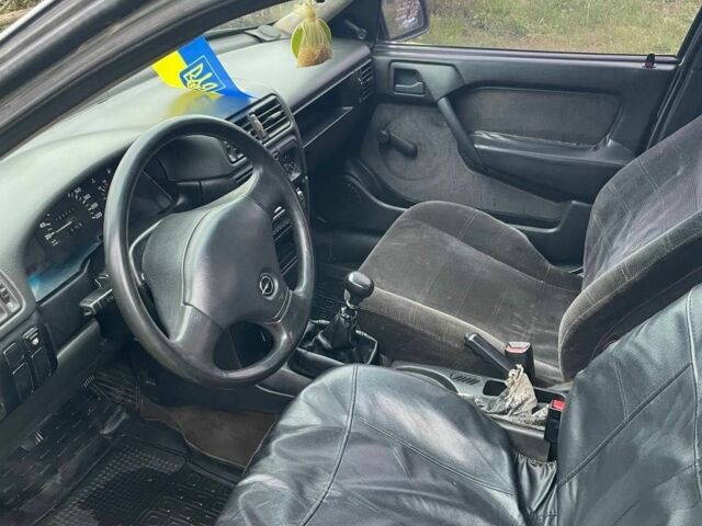 Сірий Опель Тігра, об'ємом двигуна 1.6 л та пробігом 326 тис. км за 1500 $, фото 5 на Automoto.ua