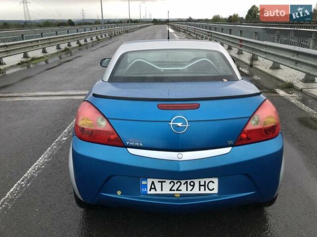 Синій Опель Тігра, об'ємом двигуна 1.8 л та пробігом 215 тис. км за 4999 $, фото 4 на Automoto.ua