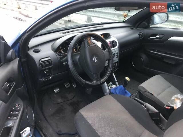 Синій Опель Тігра, об'ємом двигуна 1.8 л та пробігом 215 тис. км за 4999 $, фото 2 на Automoto.ua