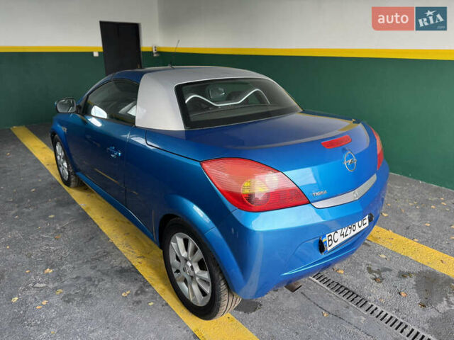 Синий Опель Тигра, объемом двигателя 1.39 л и пробегом 200 тыс. км за 4300 $, фото 12 на Automoto.ua