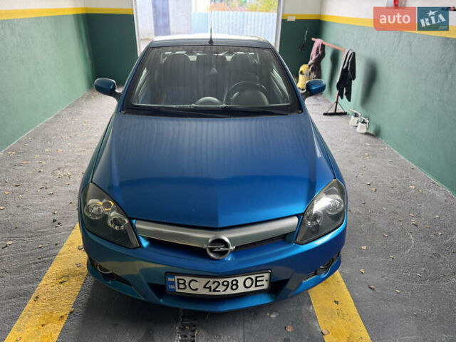 Синий Опель Тигра, объемом двигателя 1.39 л и пробегом 200 тыс. км за 4300 $, фото 10 на Automoto.ua
