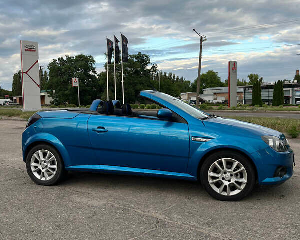 Синий Опель Тигра, объемом двигателя 1.2 л и пробегом 220 тыс. км за 4900 $, фото 9 на Automoto.ua