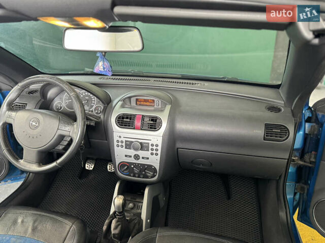 Синий Опель Тигра, объемом двигателя 1.39 л и пробегом 200 тыс. км за 4300 $, фото 17 на Automoto.ua