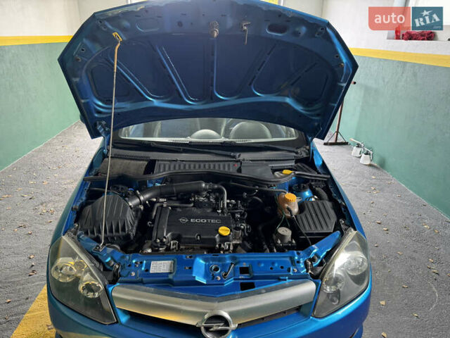 Синий Опель Тигра, объемом двигателя 1.39 л и пробегом 200 тыс. км за 4300 $, фото 26 на Automoto.ua