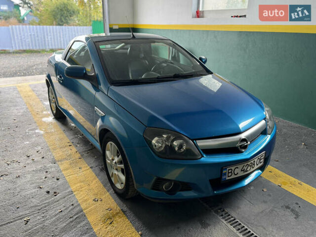 Синий Опель Тигра, объемом двигателя 1.39 л и пробегом 200 тыс. км за 4300 $, фото 1 на Automoto.ua