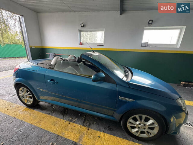 Синий Опель Тигра, объемом двигателя 1.39 л и пробегом 200 тыс. км за 4300 $, фото 16 на Automoto.ua