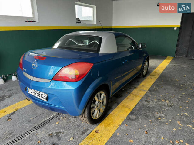 Синий Опель Тигра, объемом двигателя 1.39 л и пробегом 200 тыс. км за 4300 $, фото 5 на Automoto.ua