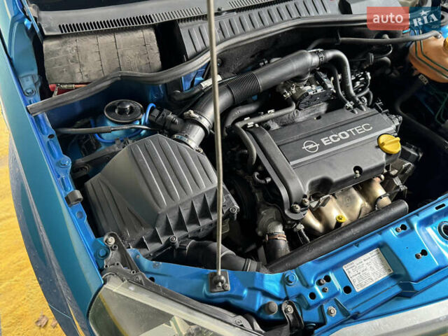 Синий Опель Тигра, объемом двигателя 1.39 л и пробегом 200 тыс. км за 4300 $, фото 22 на Automoto.ua