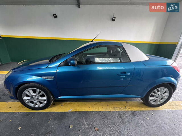 Синий Опель Тигра, объемом двигателя 1.39 л и пробегом 200 тыс. км за 4300 $, фото 6 на Automoto.ua