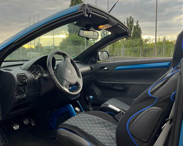 Синий Опель Тигра, объемом двигателя 1.2 л и пробегом 220 тыс. км за 4900 $, фото 3 на Automoto.ua