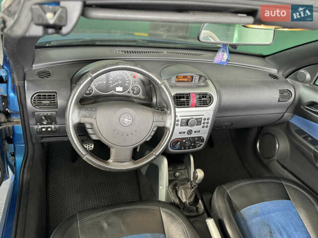 Синий Опель Тигра, объемом двигателя 1.39 л и пробегом 200 тыс. км за 4300 $, фото 19 на Automoto.ua