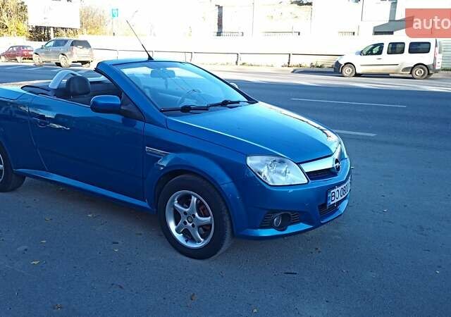 Синий Опель Тигра, объемом двигателя 1.3 л и пробегом 215 тыс. км за 5700 $, фото 11 на Automoto.ua