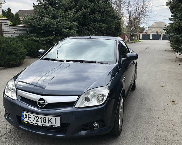 Синий Опель Тигра, объемом двигателя 1.3 л и пробегом 236 тыс. км за 4100 $, фото 6 на Automoto.ua