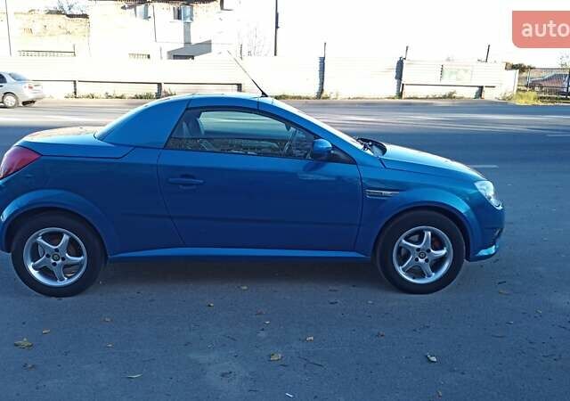 Синий Опель Тигра, объемом двигателя 1.3 л и пробегом 215 тыс. км за 5700 $, фото 4 на Automoto.ua