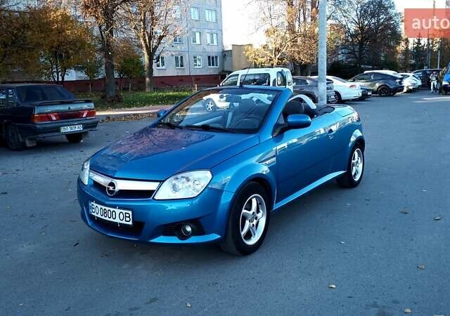 Синий Опель Тигра, объемом двигателя 1.3 л и пробегом 215 тыс. км за 5700 $, фото 9 на Automoto.ua