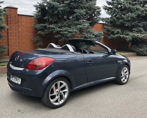 Синий Опель Тигра, объемом двигателя 1.3 л и пробегом 236 тыс. км за 4100 $, фото 2 на Automoto.ua