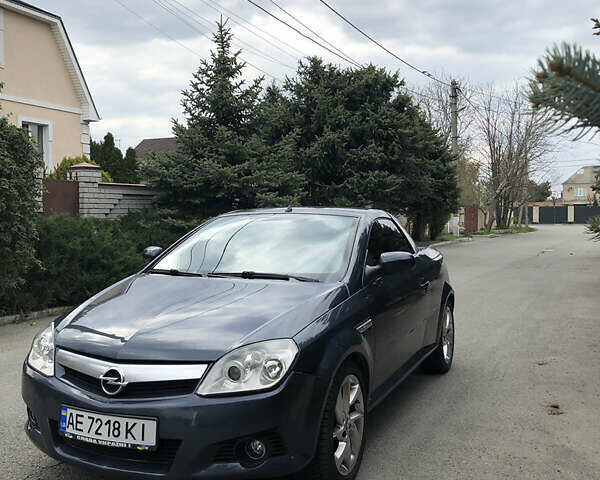 Синий Опель Тигра, объемом двигателя 1.3 л и пробегом 236 тыс. км за 4100 $, фото 11 на Automoto.ua