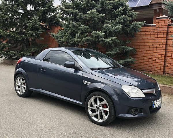 Синий Опель Тигра, объемом двигателя 1.3 л и пробегом 236 тыс. км за 4100 $, фото 7 на Automoto.ua