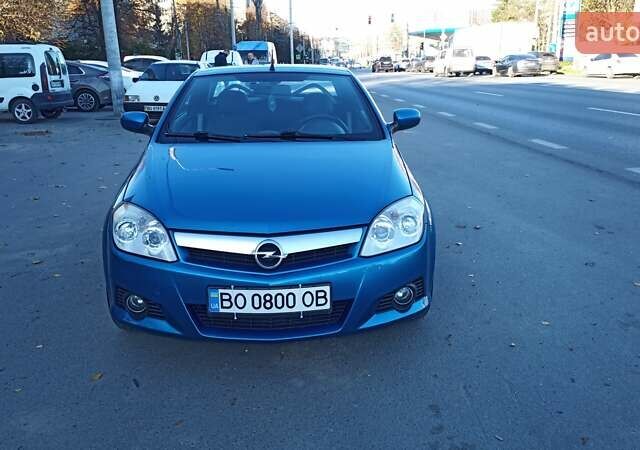 Синий Опель Тигра, объемом двигателя 1.3 л и пробегом 215 тыс. км за 5700 $, фото 2 на Automoto.ua