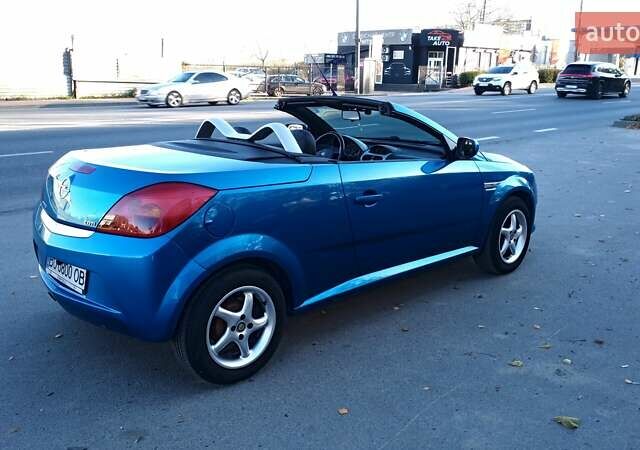 Синий Опель Тигра, объемом двигателя 1.3 л и пробегом 215 тыс. км за 5700 $, фото 13 на Automoto.ua