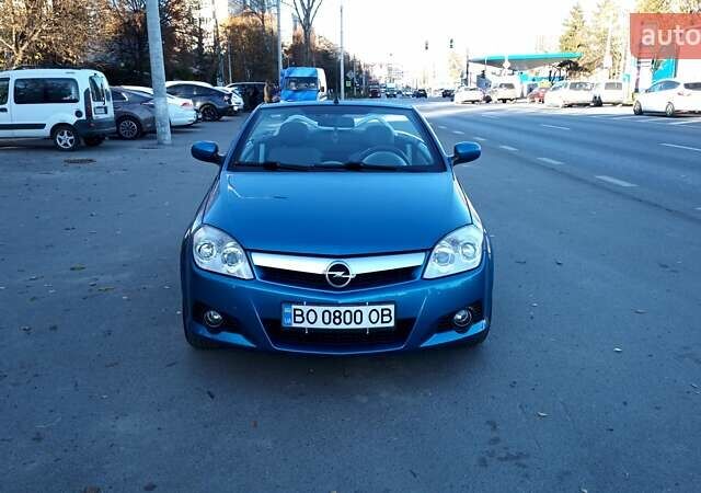 Синий Опель Тигра, объемом двигателя 1.3 л и пробегом 215 тыс. км за 5700 $, фото 10 на Automoto.ua