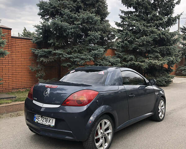 Синий Опель Тигра, объемом двигателя 1.3 л и пробегом 236 тыс. км за 4100 $, фото 8 на Automoto.ua