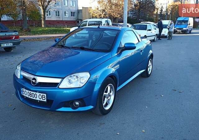 Синий Опель Тигра, объемом двигателя 1.3 л и пробегом 215 тыс. км за 5700 $, фото 1 на Automoto.ua