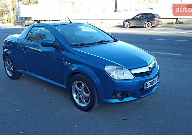 Синий Опель Тигра, объемом двигателя 1.3 л и пробегом 215 тыс. км за 5700 $, фото 3 на Automoto.ua