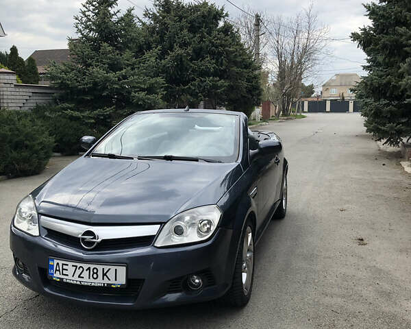 Синий Опель Тигра, объемом двигателя 1.3 л и пробегом 236 тыс. км за 4100 $, фото 4 на Automoto.ua