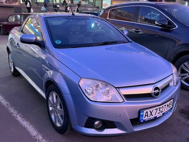 Синий Опель Тигра, объемом двигателя 1.4 л и пробегом 215 тыс. км за 4000 $, фото 1 на Automoto.ua