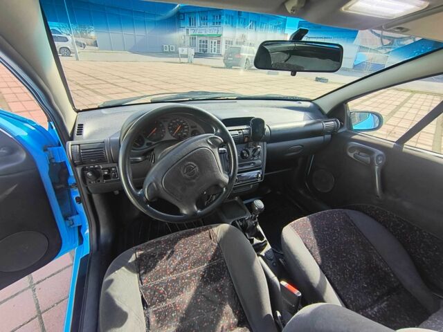 Синий Опель Тигра, объемом двигателя 1.4 л и пробегом 269 тыс. км за 2999 $, фото 7 на Automoto.ua