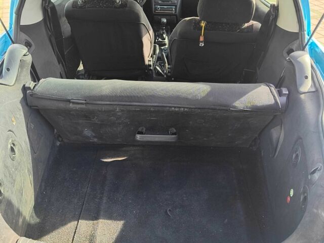 Синий Опель Тигра, объемом двигателя 1.4 л и пробегом 269 тыс. км за 2999 $, фото 5 на Automoto.ua