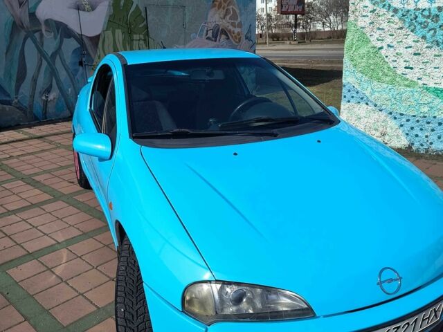 Синий Опель Тигра, объемом двигателя 1.4 л и пробегом 269 тыс. км за 2999 $, фото 2 на Automoto.ua