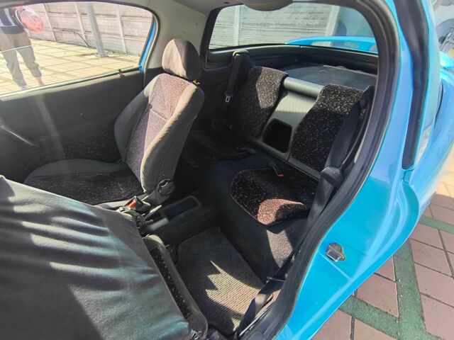 Синий Опель Тигра, объемом двигателя 1.4 л и пробегом 269 тыс. км за 2999 $, фото 8 на Automoto.ua