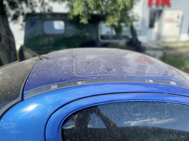 Синий Опель Тигра, объемом двигателя 1.4 л и пробегом 3 тыс. км за 1900 $, фото 5 на Automoto.ua